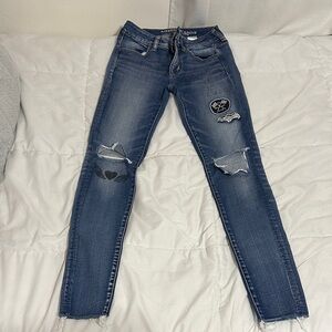 American Eagle Distressed Dark Blue Skinny Jeans with Patches